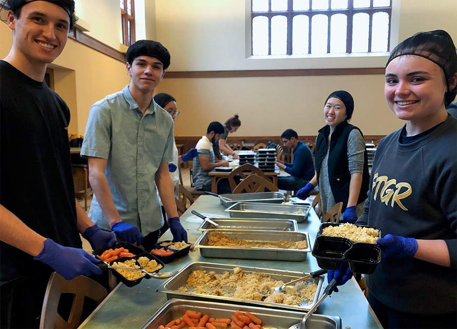 students serving food