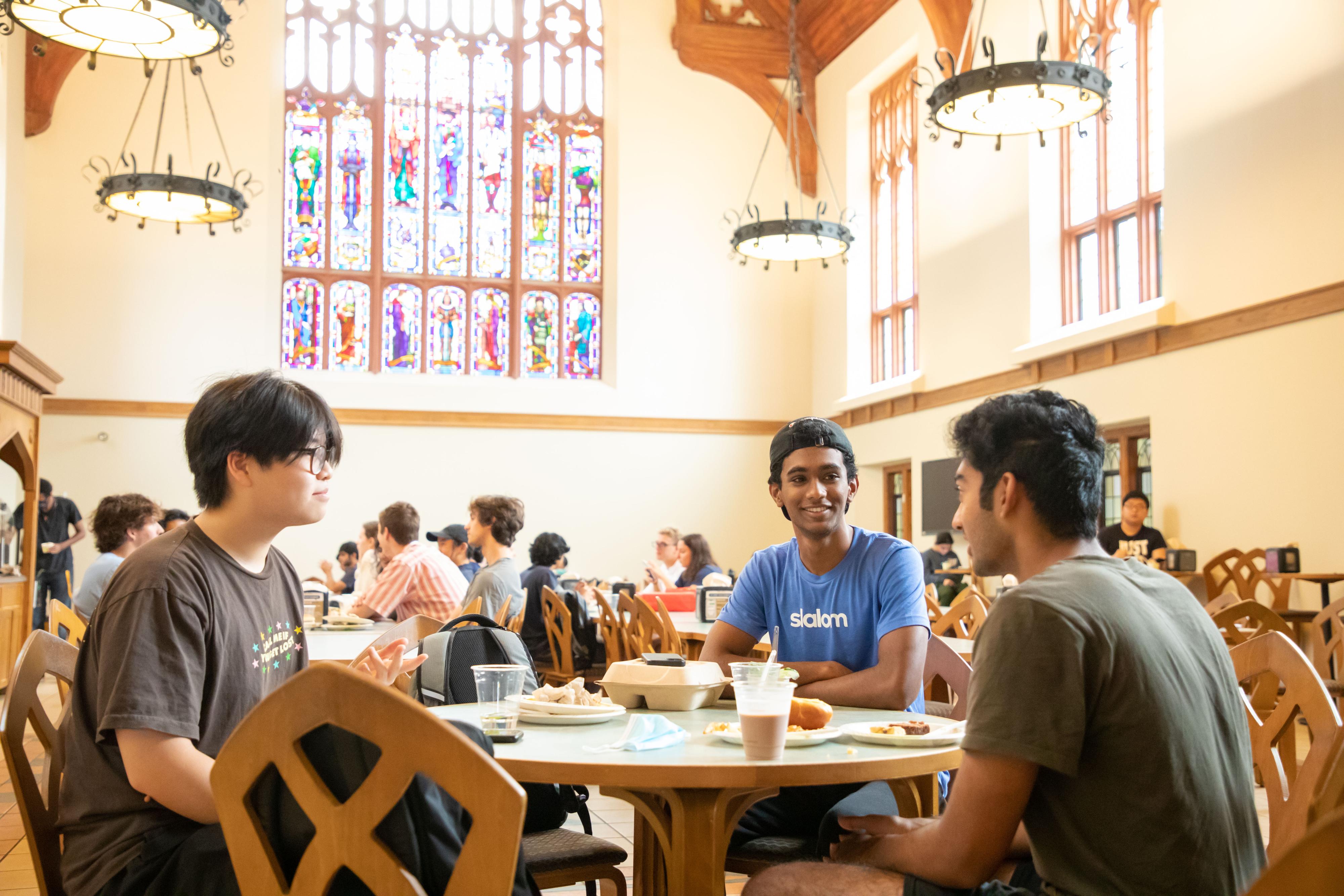 students eating in brittain dining hall.