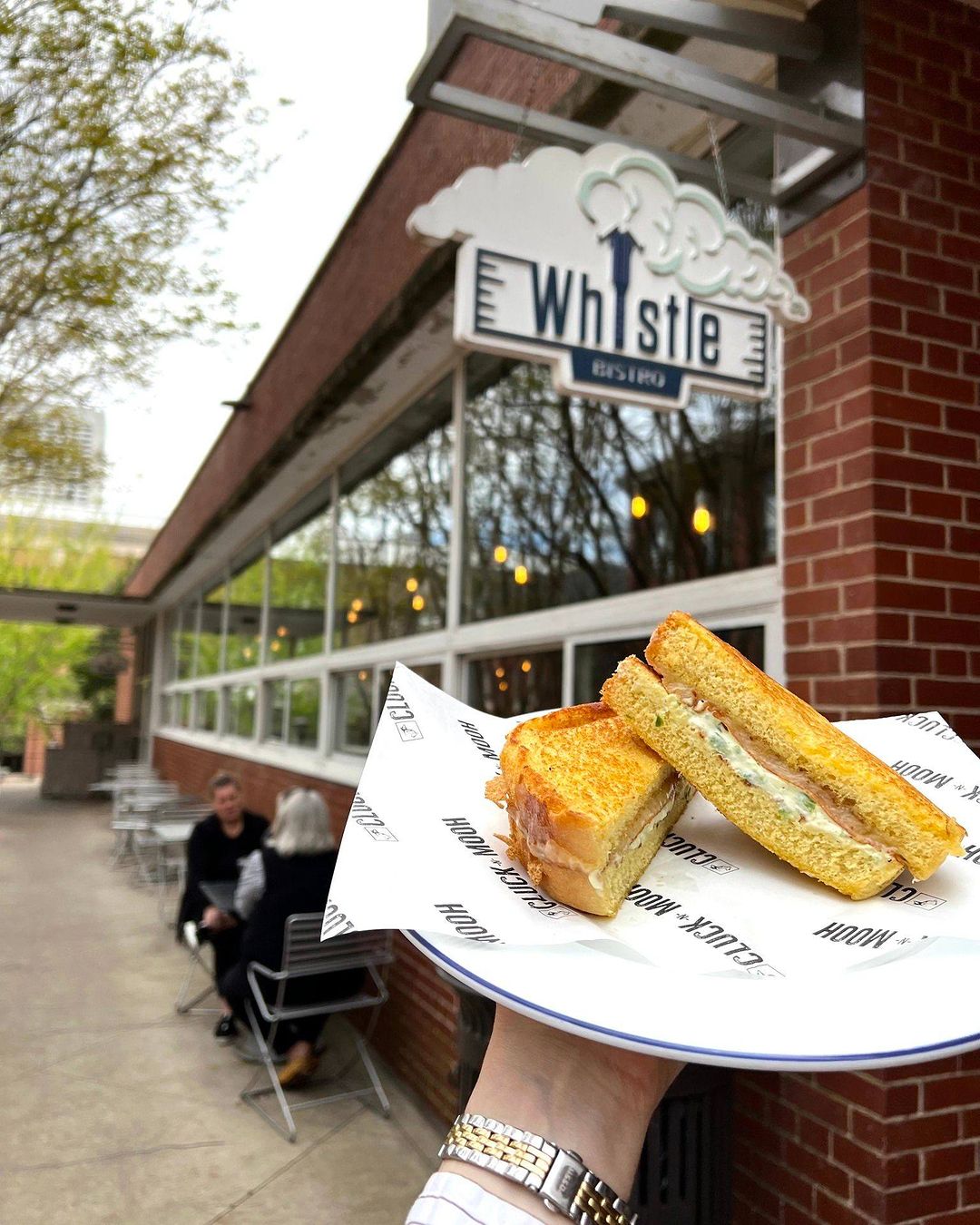 Sandwich in front of Whistle Bistro