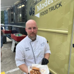 Chef Dave in front of the Model A food truck